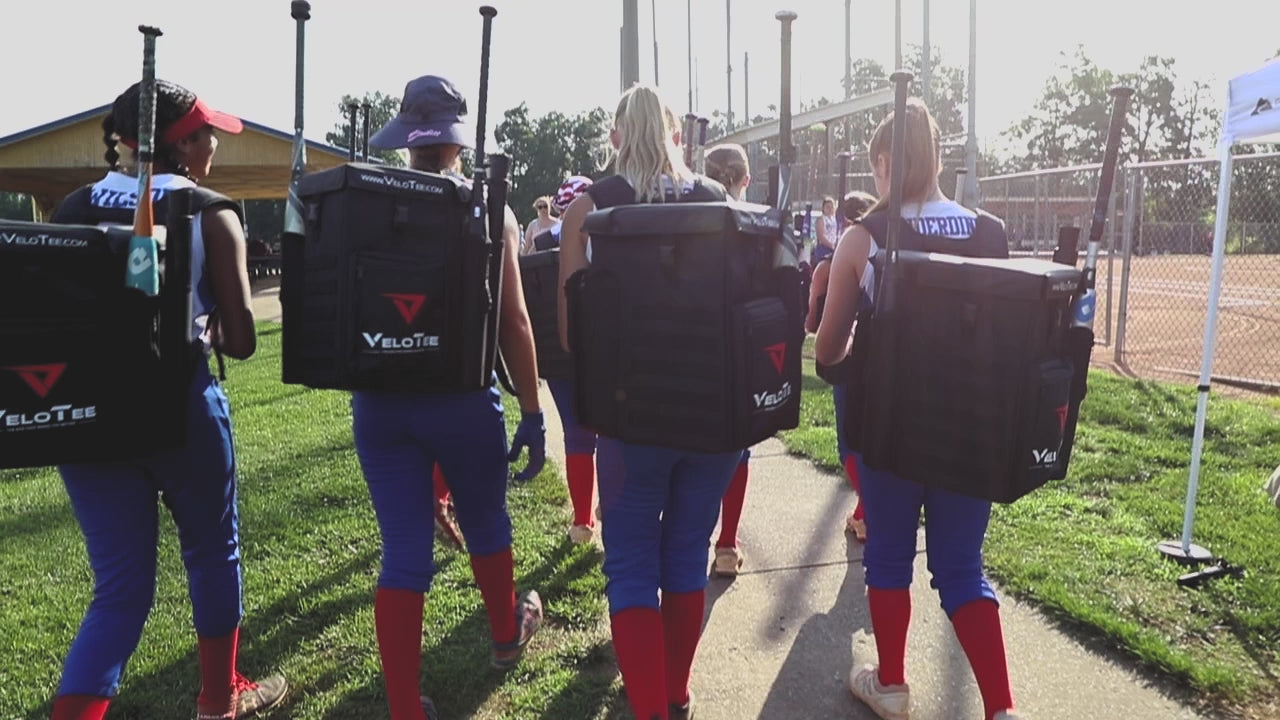 Load video: VeloTee Baseball &amp; Softball Bat Bag that Comes with a Batting Tee Video that shows how baseball and softball players can hit right off of their bat bag. 